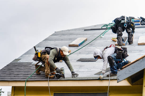 Professional Emergency Roof Repair technician working in Kensington, NY